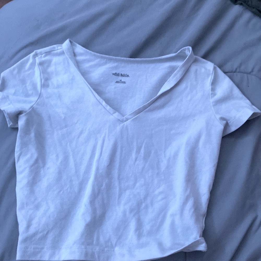 white V-neck cropped shirt